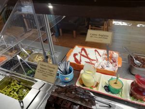 The desserts buffet with signs as to what is vegan at La Faim Des Haricots in Blagnac