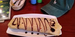 Pancake with banana and chocolate at El Encuentro - Santa Catalina in Cusco