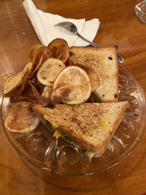 Grilled cheese with pesto and homemade chips- yummy!   at Saint August Maison in Slidell