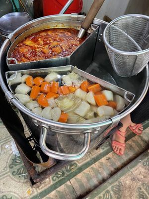 Soup cooking   at HÚ TIỂU MÌ CHAY 59 in Ho Chi Minh City
