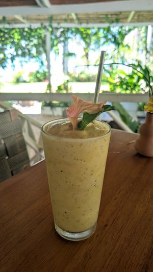 Passionfruit Ginger smoothie with a shot of rum added. at Spicy Coconut in Cocles