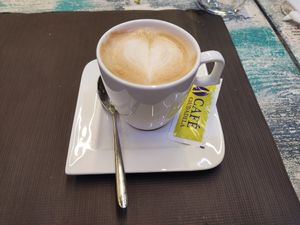 Café con leche vegetal. at Mesón de la Tortilla in Pamplona