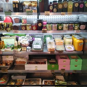Our Ooh La La Marche Fridge for convenient Grab-and-Go items - inside our shop filled with delicious healthy vegan things to eat! at The Edible Journey in Port Stanley