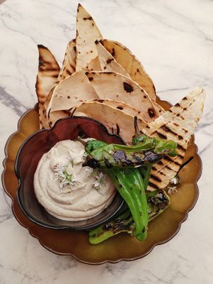 Cashew Green Chili Queso with grilled Corn Chips and Shishito Peppers at The Edible Journey in Port Stanley