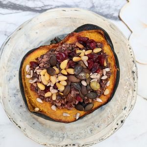 Mushroom Chestnut Stuffed Acorn Squash with cranberries, seeds and pinenuts *Vegan/GF at The Edible Journey in Port Stanley