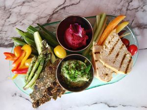 Grazing Plate featuring seasonal veggies, Basil Pesto (vegan) and Beet Walnut Hummus *Vegan/GF at The Edible Journey in Port Stanley