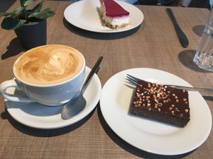 Gluten-free chocolate protein bar with sweet potato and cappuccino with soy milk at Goodies Berlin - Schlachtensee in Berlin