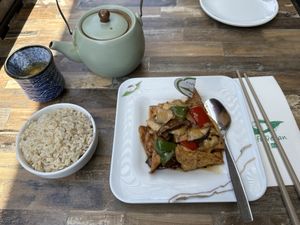 Tofu mushroom dish with brown rice and Chinese tea  at Tofu Vegan - Charlotte in London