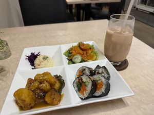 My choice of meal started with miso soup. The main course included a salad, potato salad, kimbap, sweet/sour cauliflower. Afterwards there was matcha pudding. Milk tea is included. at MERCY Vegan Factory - Kyoto Station in Kyoto