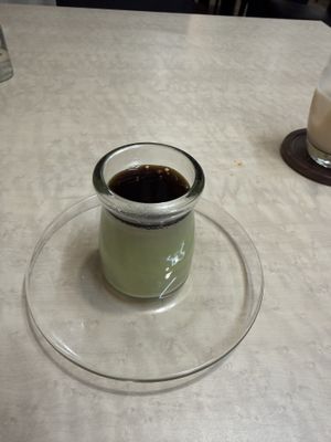 Match pudding with sweet syrup on top. Very tasty! I haven't had matcha much beforehand but loved this!  at MERCY Vegan Factory - Kyoto Station in Kyoto