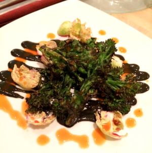 Starter - sprouting broccoli with black sesame sauce at Maitreya Social in Bristol