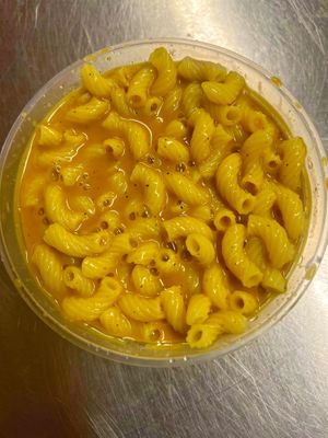 8oz gluten free elbow noodles coated in our Yellow Flash cheese sauce. at Hidden Leaf Cafe in Columbus