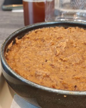 
Creamy foul :
Preparation based on whole beans, tomato medames, onions, lemon and spices
 at Veganil in Paris