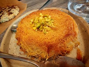 
Kunafa:
Angel hair stuffed with vegetable “echta” (a kind of Egyptian-style custard) 
 at Veganil in Paris