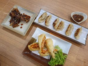 Teriyaki chicken, gyoza and spring rolls. Spring rolls not recommended! at Teng Bespoke Vegetarian Restaurant - 藤 in Central Singapore