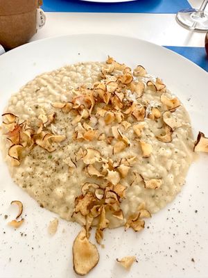 Risotto al sedano rapa con chips di toponambur  at La Casina di Alice in Livorno