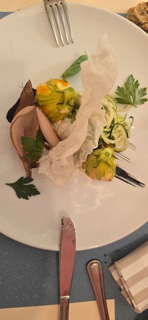 antipasto with fiori di zucca, zucchini ribbons and oven cooked onions at La Casina di Alice in Livorno