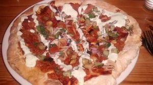 Lamachan pizza - Turkish pizza with spicy mince, roasted aubergine, onion, lime and coriander yogurt, sumac at Mono in Glasgow