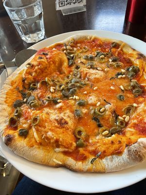 Pizza -olive, caper, pine nut and vegan mozzarella  at Mono in Glasgow