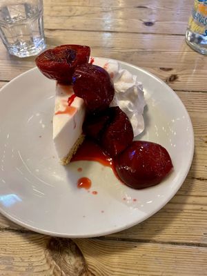 Cheesecake with plums and cream  at Mono in Glasgow
