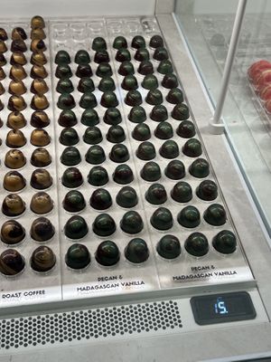 Pecan & Madagascan Vanilla 2,50€  at Madaq Chocolatier  in Haarlem