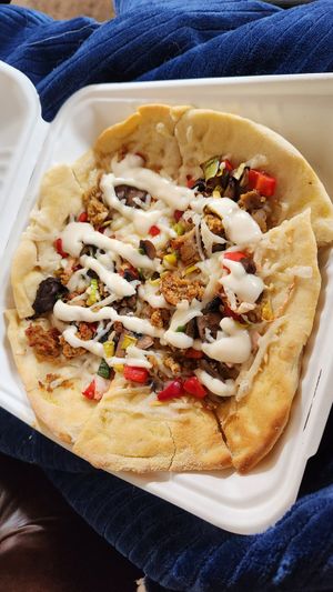 Flatbread Special - Roasted Garlic Aioli and Italian Sausage at The Red Fern in Rochester