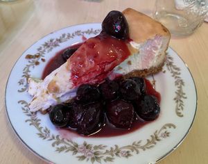 Cheesecake with cherry sauce!  at The Red Fern in Rochester