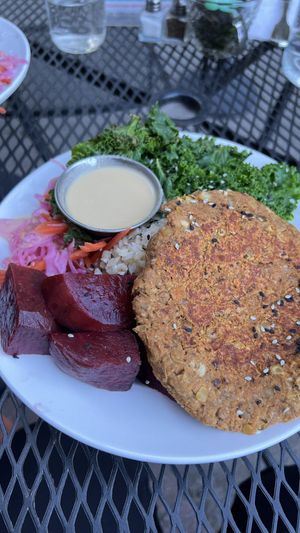 Buddha Bowl (GF) – oil-free option without the dressing: lentil burger patty steamed on the grill, coconut brown rice, steamed kale, chilled beets, pickled carrots & cabbage.   at The Red Fern in Rochester