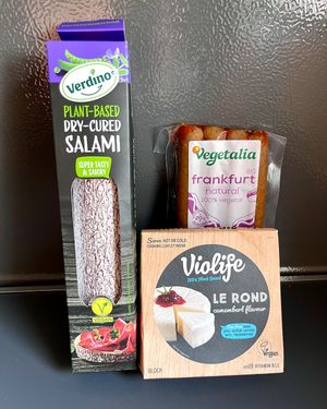 Bought vegan products: salami, Frankfurt sausages and camembert at Dietètica Nogal in Premia De Mar