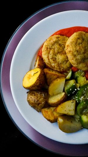 Kotlety Janowickie
Kotlety z kaszy jaglanej i kapusty kiszonej z majerankiem, Ajvar, pieczony ziemniak, gnieciony ogórek at NO TU OliDeli in Warsaw