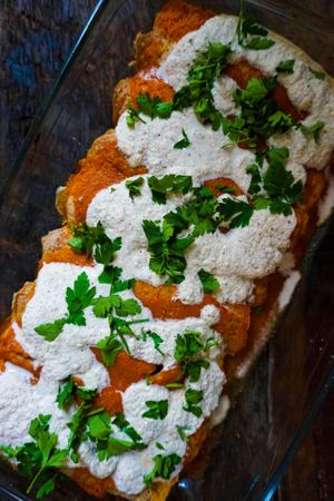 Alkaline enchiladas with housemade brazilian nut cheese & heirloom tomato sauce at Alkaline Valley - Order & Pick-Up in Amsterdam