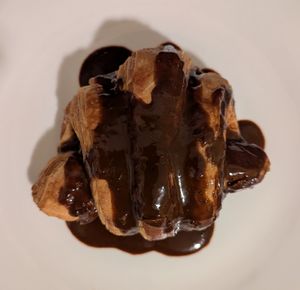 mole tamale croissant with mole sauce at 222 Pastry - Pre-order only in Portland