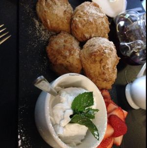 scones with coconut cream and strawberries  at Raw - La Suite West in West London