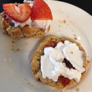 scones with coconut cream and strawberries  at Raw - La Suite West in West London