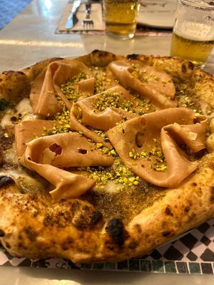 Mortadella vegan e pistacchio at Assaje  in Milan