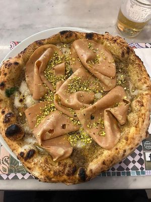 Mortadella vegan e pistacchio at Assaje  in Milan