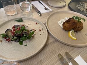 Aubergine roll ups and “fish"  at Manna 2 in Warsaw