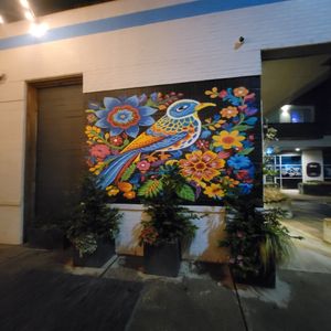 Outdoor artwork on patio at Otomi in Raleigh
