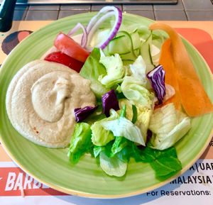 Hummus and salad bar items at Barbeque Nation - Avenues Mall in Muscat