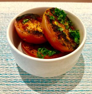 Herbed grilled tomatoes  at Wave Restaurant in Muscat
