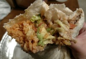 Veggie Burrito.  Vegan options are fabulous!  It is so wonderful to find a Mexican restaurant that doesn't use chicken stock or butter in the rice, doesn't use lard in the beans, and doesn't add milk or milk powder to the guacamole!  They also don't use peanut oil (if that is an allergy concern). at La Quesadilla Mexican Grill in St John