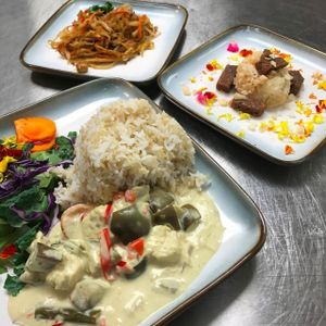 Everything vegan! Tofu curry, pad thai with green papaya "noodles", kulolo and coconut sticky rice at Roots Cafe in Honolulu