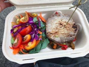 Kalo (taro) sandwich, with avocado, roasted red peppers and onions, side salad. at Roots Cafe in Honolulu