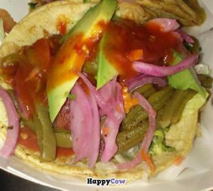 Cactus tacos topped with spicy pickled onions at Tacos El Cunado - Downtown Market in Grand Rapids