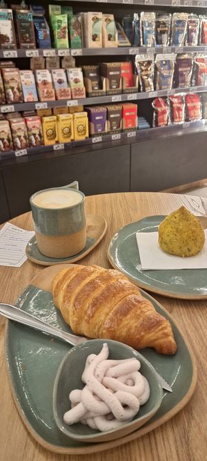 Deliciosa coxinha, croissant com queijo e café com leite vegetal at VegSim - Rua Canário in Sao Paulo