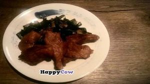 Sauteed seitan, piquancy of which is exquisitely mingled with the wild sea smell wakame emits unostentatiously which testifies to its capacity as a garnish. at Asahi in Tokyo