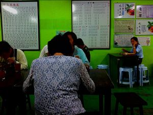 bright yellow-green at the backdrop  at Meow Yean Vegetarian in Sungai Petani