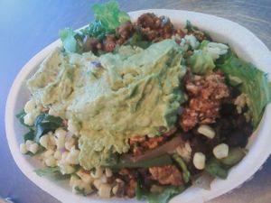 Sofritas Salad (sofritas spicy tofu, corn, peppers, onion, lettuce, brown rice, black beans, and guacamole.) at Chipotle - Strada Pl in Naples