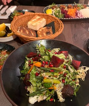 Beautiful salad accompanied by yummy appetisers! at Cappadocia in Bristol