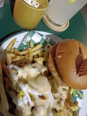 Chicken burger with loaded fries at Neat Burger - Porta Venezia in Milan